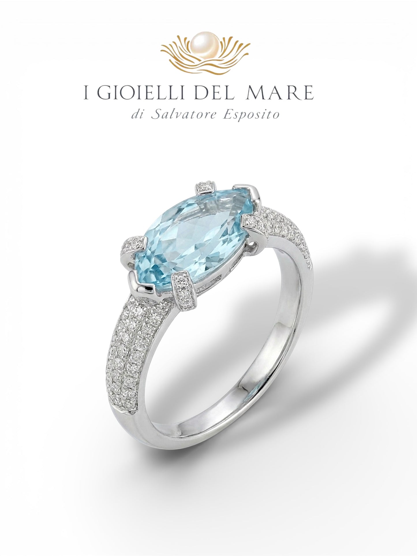 Anello in oro bianco con brillantini ed acquamarina (Info su richiesta)