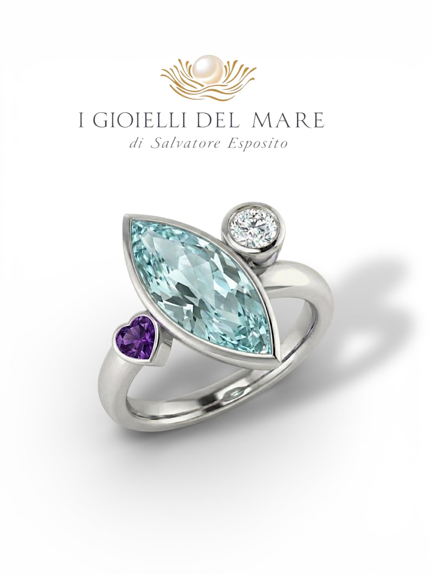 Anello in oro bianco con acquamarina taglio marquise , cuoricino in ametista e brillante (Info su richiesta)