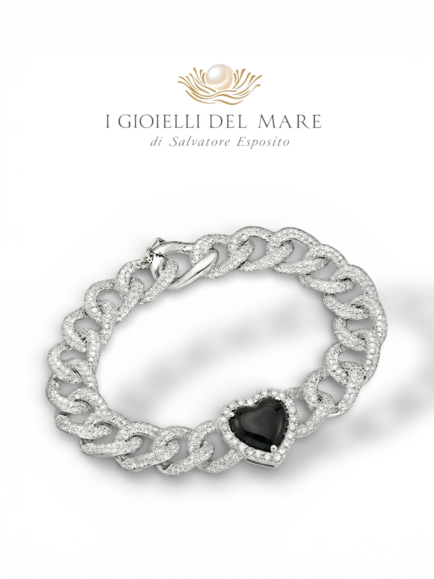 Bracciale in oro bianco e brillantini con diamante nero taglio cuore (Info su richiesta)