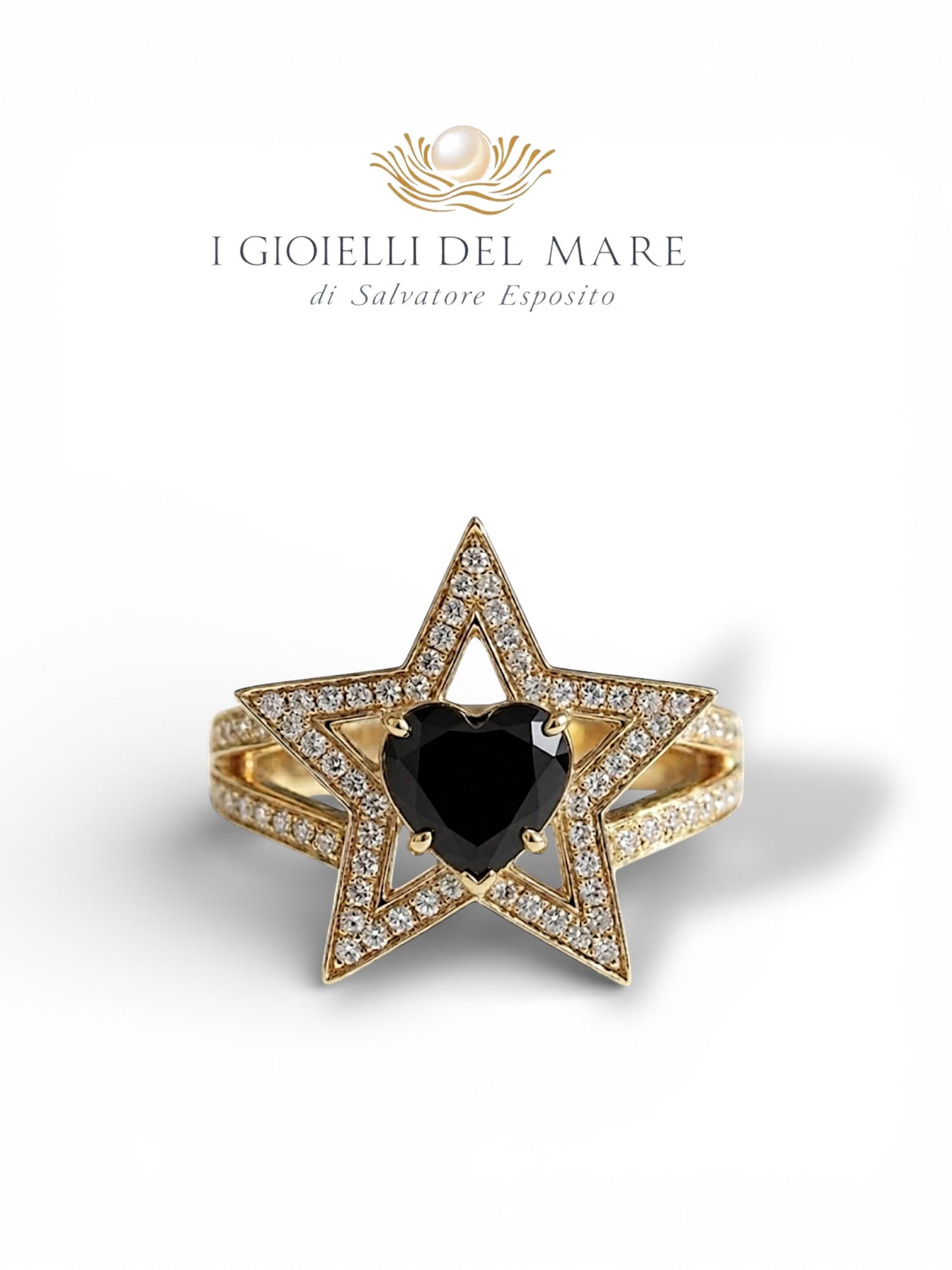 Anello in oro con diamantini e diamante nero taglio cuore ( Info su richiesta)