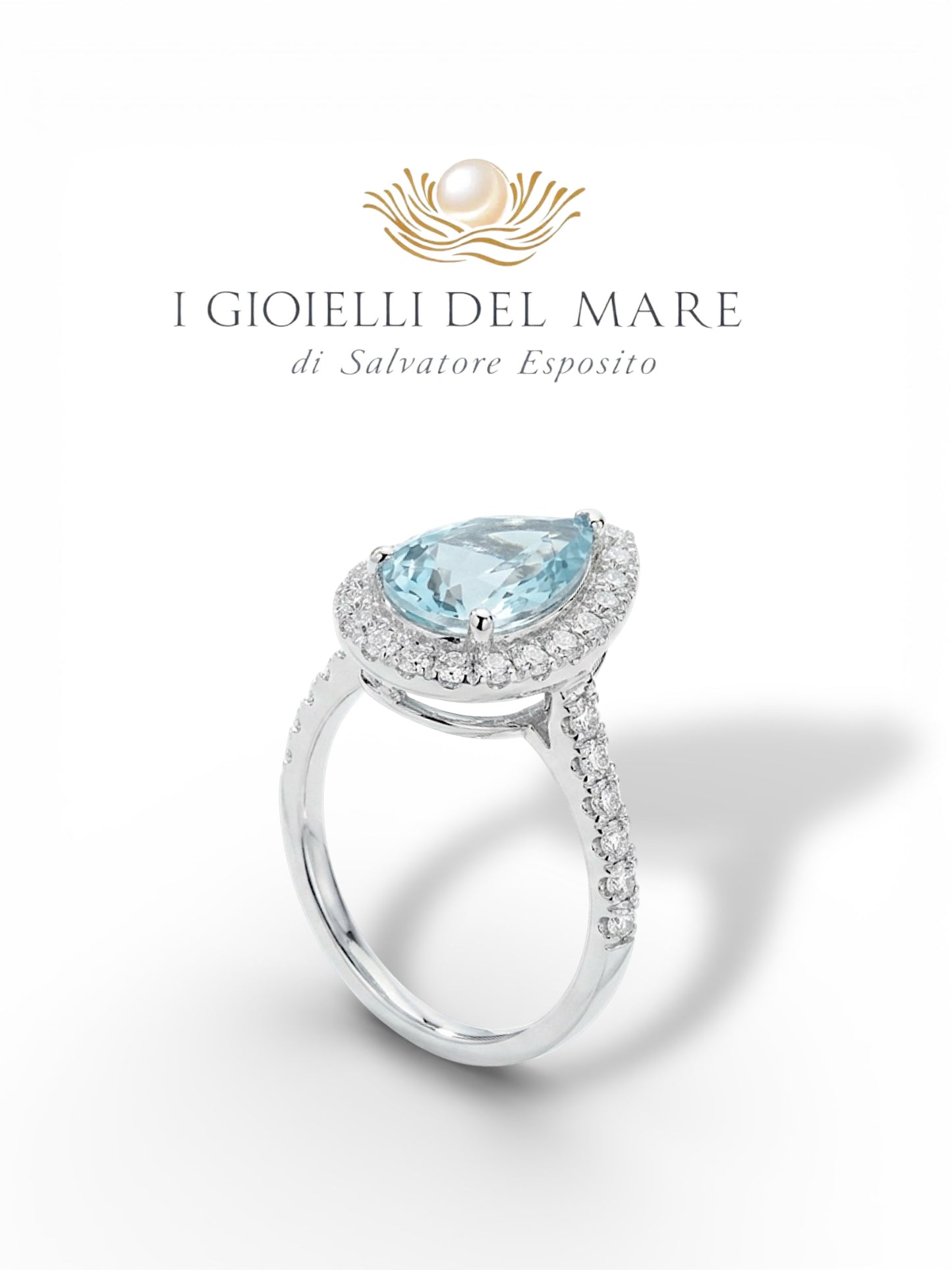 Anello in oro bianco con brillanti ed acquamarina a goccia