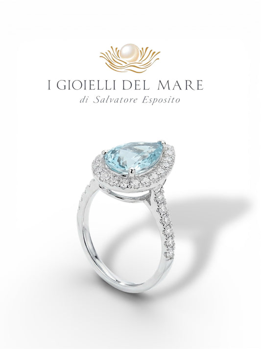 Anello in oro bianco con brillanti ed acquamarina a goccia