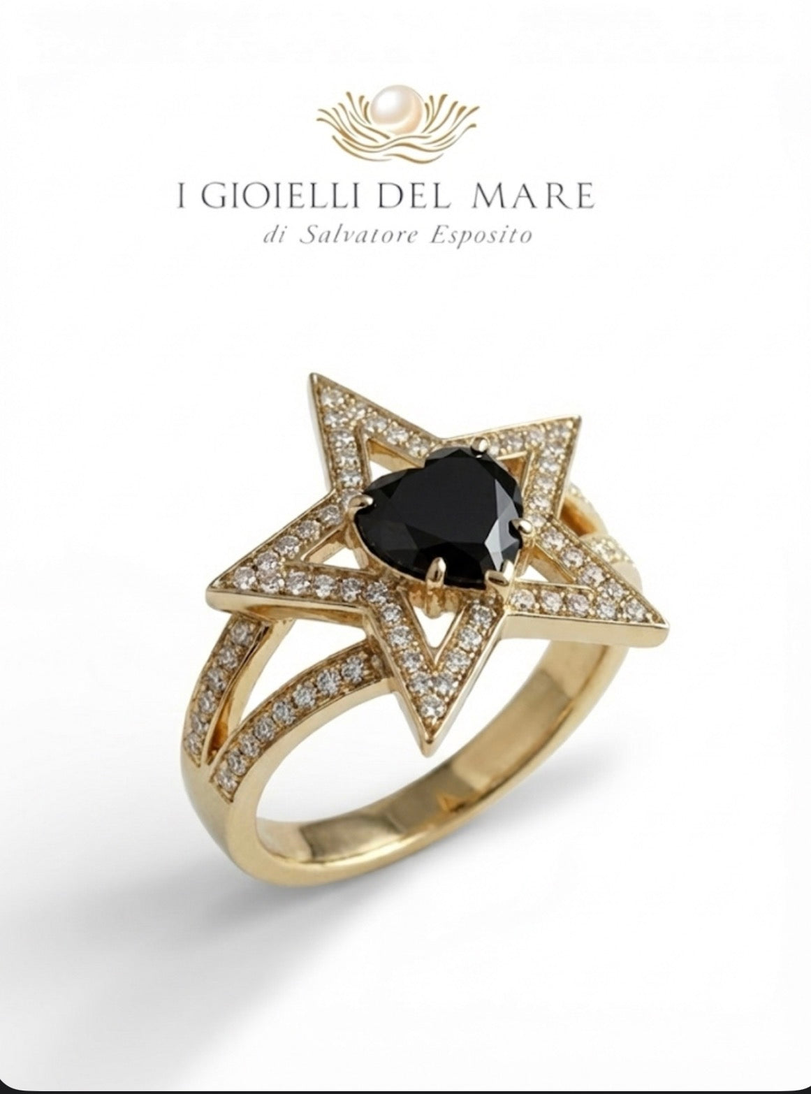 Anello in oro con diamantini e diamante nero taglio cuore ( Info su richiesta)