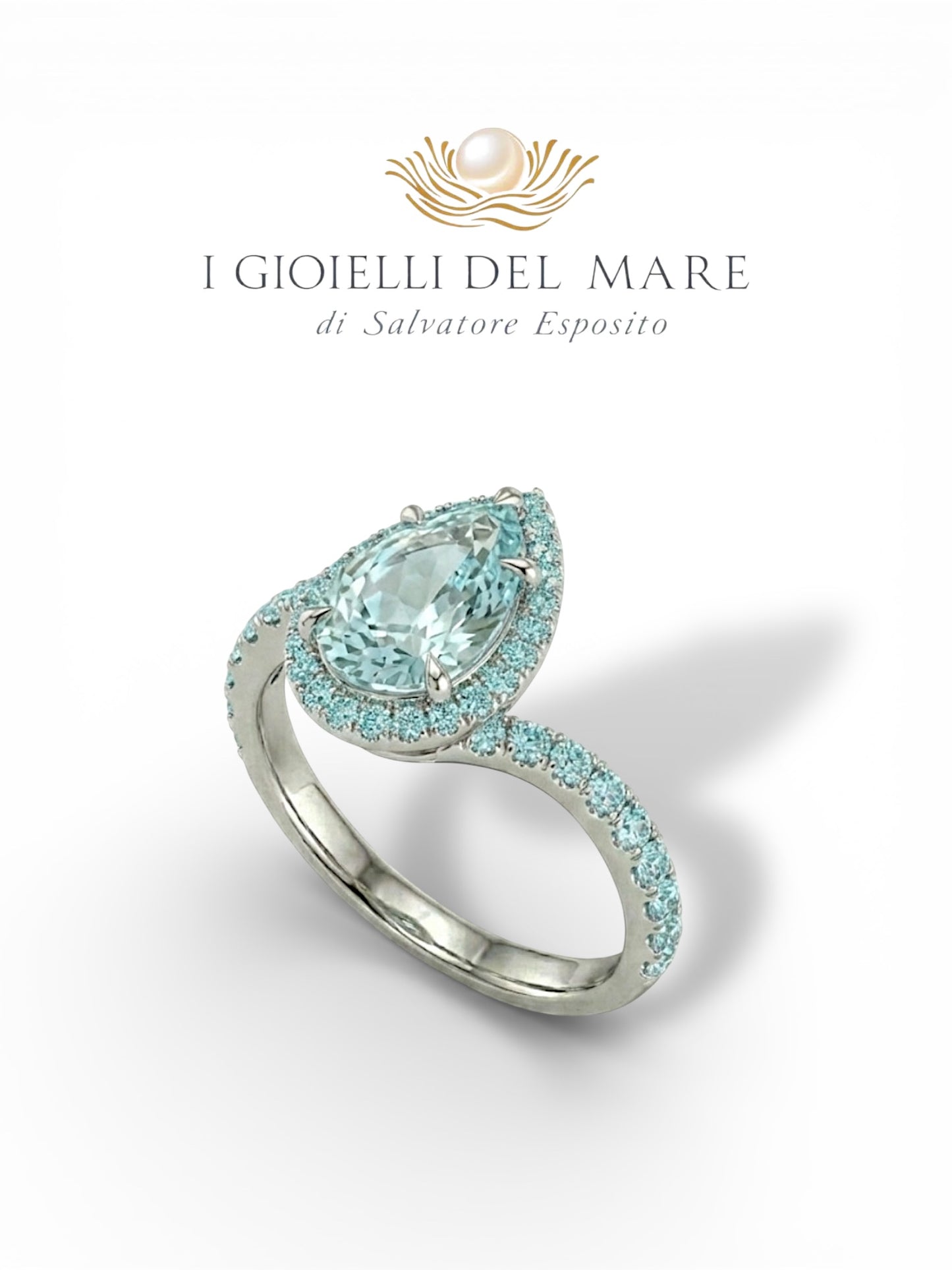 Anello in oro bianco con goccia di acquamarina e pavé di acquamarina (Info su richiesta)